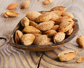 almond nuts on wooden table