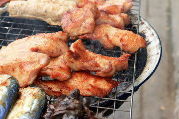 A lot of pork on the grill