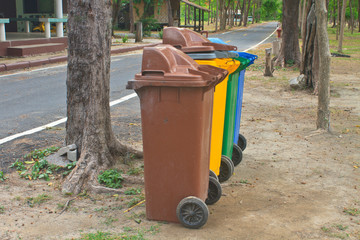 Fototapeta na wymiar Different colorful recycle bins