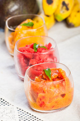 frozen fruit pressed shake topped with stevia leaves