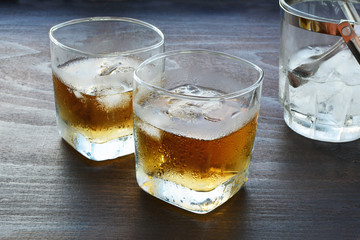 Glass of whiskey over ice