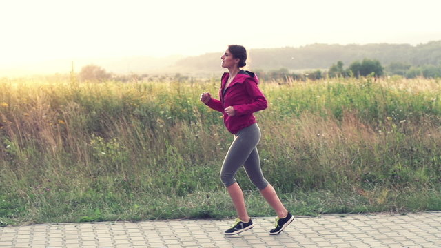 Woman jogging in the country, super slow motion, shot at 240fps