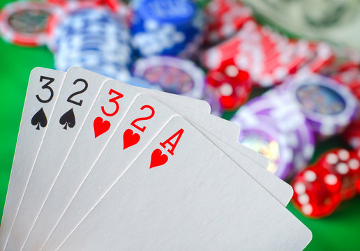 Card for poker in the hand, chips and card for poker