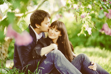 Fototapeta premium Young kissing happy couple in love