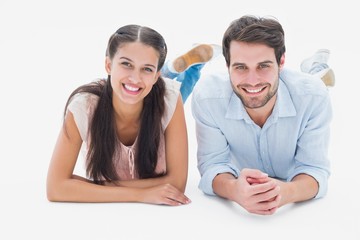Fototapeta premium Attractive young couple smiling at camera