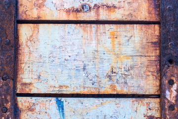 Old wood background texture. Vintage warehouse door and metal el