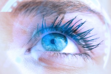 Composite image of close up of female blue eye