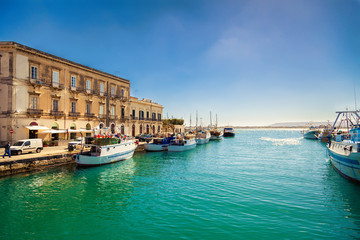 fishing boats in the harbor of Ortigia island