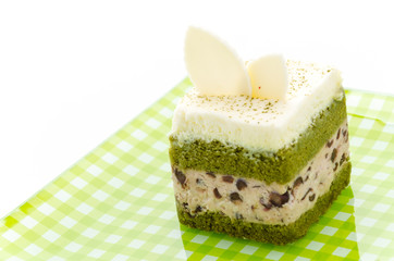Matcha green tea cake isolated on white background
