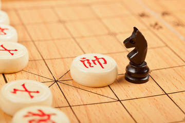 Western chess piece on Chinese chess board