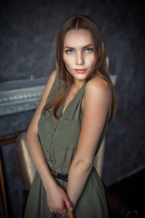 Portrait of young beautiful girl with brown hair.