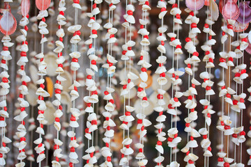 Obraz premium Sea shell mobile as house decoration