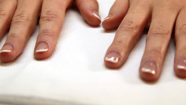 Hands showing fresh french manicure