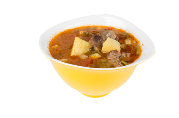 Goulash soup in a yellow bowl