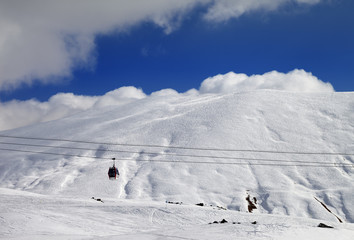 Gondola lift and off-piste slope