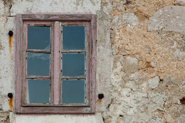 Fototapeta na wymiar Detail of old wooden window at Lubenice - Cres