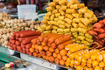The fried sausage with stick for sell in Thai style