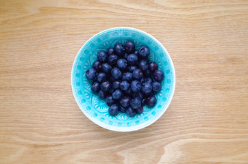 Blueberries in oriental bowl with copy space