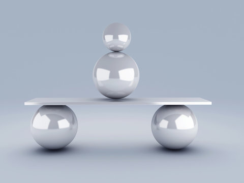 white spheres in equilibrium. balance concept