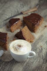 Coffee cup and chocolate cake