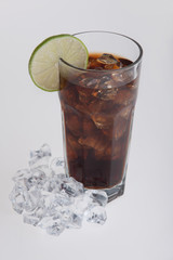Cola in highball glass with lemon slice