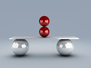red spheres in equilibrium. balance concept