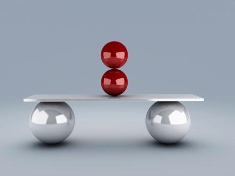 red spheres in equilibrium. balance concept