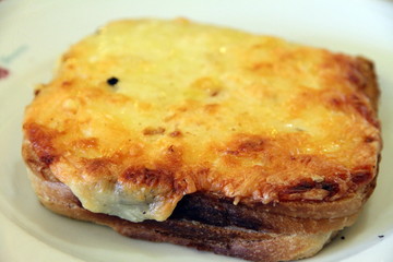 Croque Monsieur with Cheese on the Top on a Plate