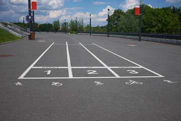 treadmill at the asphalt with the numbering and symbol