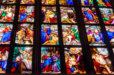 Colorful stained-glass windows in Duomo (Cathedral) in Milan.
