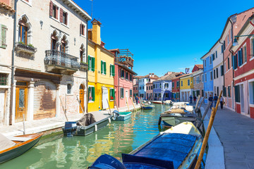 Fototapeta premium Canal and colorful buildings in Burano island, Venice, Italy