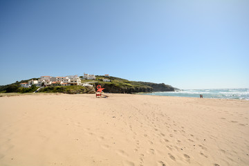 Fototapeta na wymiar Praia de Odeceixe, West Coast Beach + Village, Algarve Portugal
