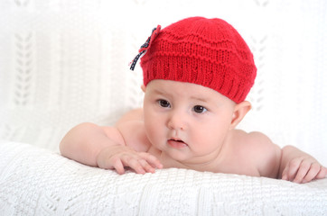 adorable baby girl in hat