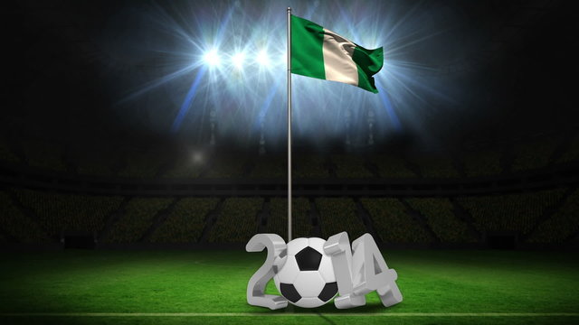Nigeria national flag waving on flagpole with 2014 message