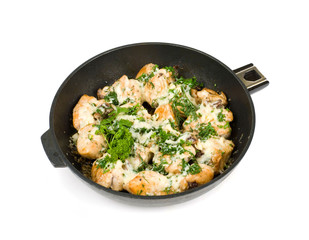 fried chicken pieces in a pan isolated on white background