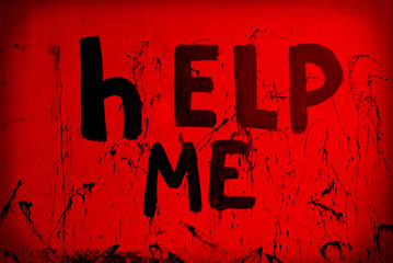 
bloody inscription "help me" on the wall