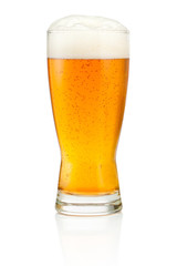 Glass of fresh beer isolated on white background