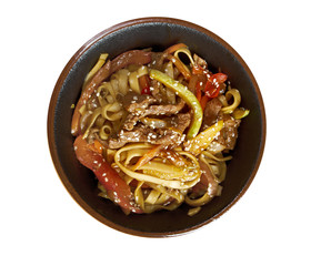 Cooking udon teppanyaki with pork