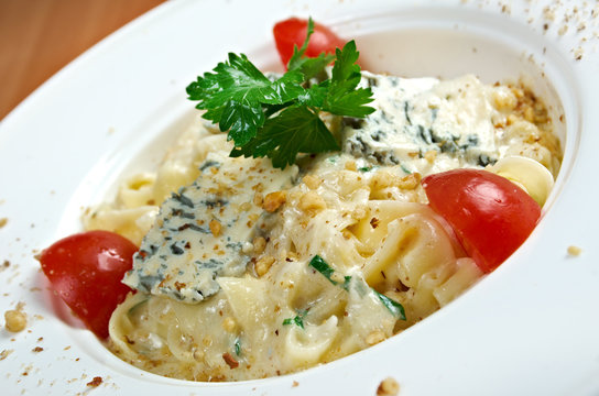 Pasta fettuccine with gourmet cheese
