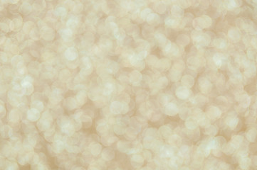 defocused abstract pale gold lights background