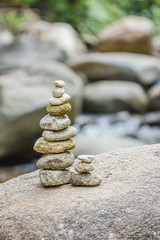 Balance stone on river coast