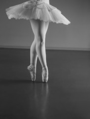 Graceful ballerina standing en pointe