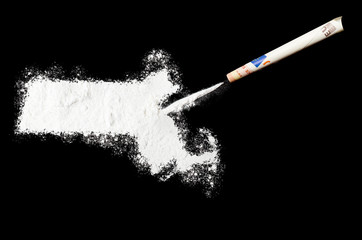 Powder drug like cocaine in the shape of Massachusetts.(series)
