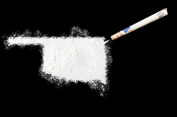 Powder drug like cocaine in the shape of Oklahoma.(series)