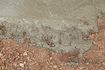 Wet cement concrete