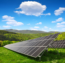 Solar energy panels in spring landscape