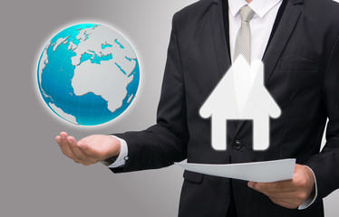 Businessman standing posture hand hold earth showing graph isola