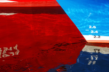 abstraction with ship reflections on water