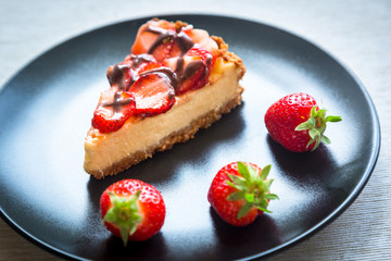 New York Cheesecake with Chocolate and Strawberries