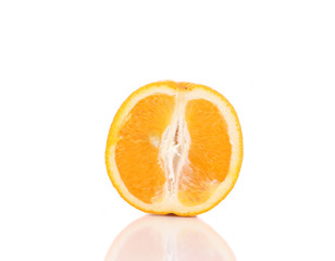 Orange fruit half.